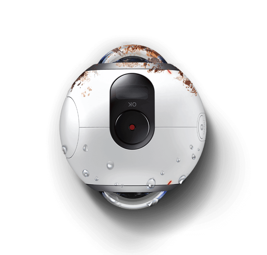 Top view of Gear 360 with one lens covered in dust and the other lens with water splashed on it.